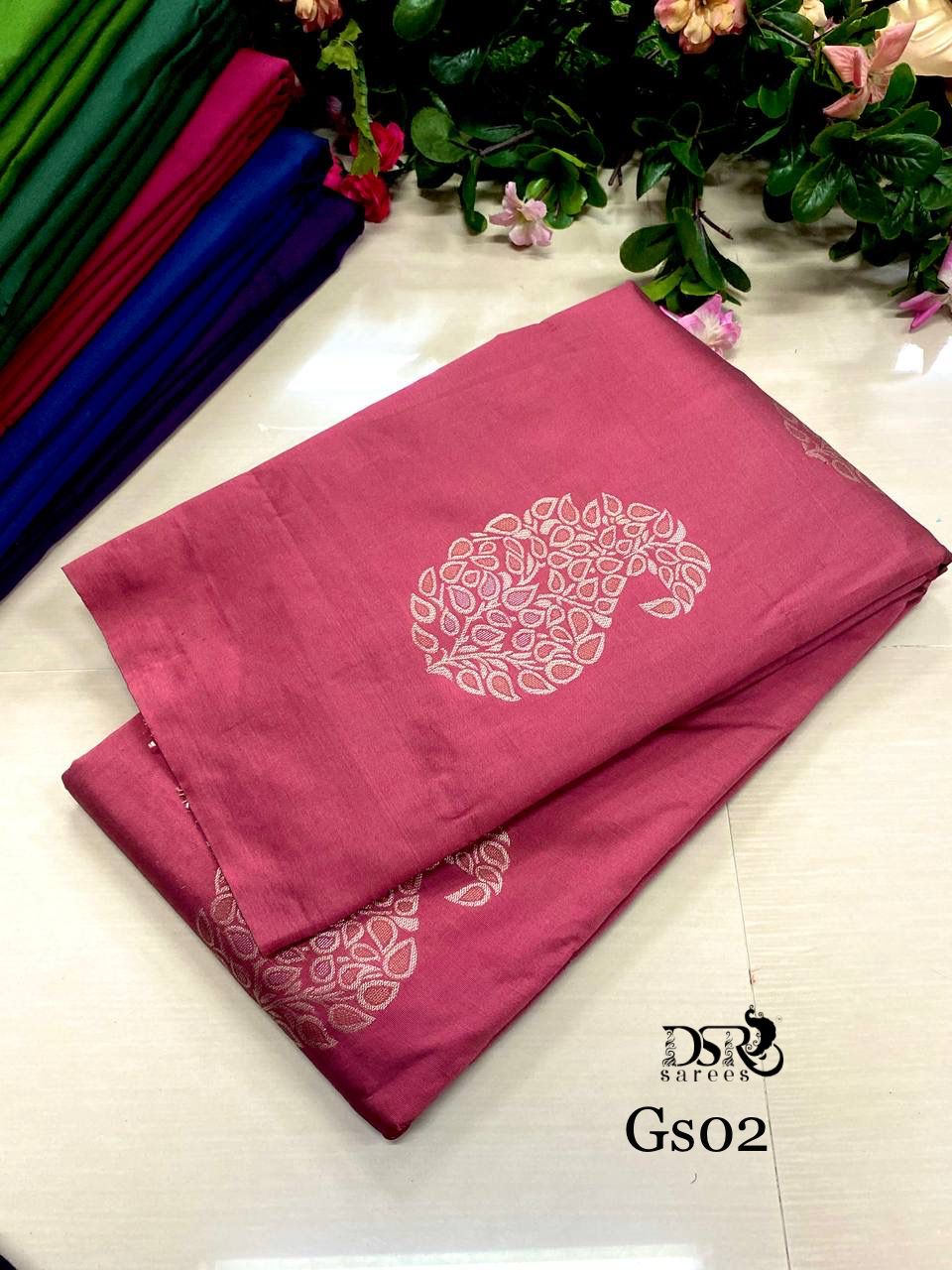 Taffy pink semi-soft silk saree with unique buttas, contrast plain border &  pallu of intricate designs